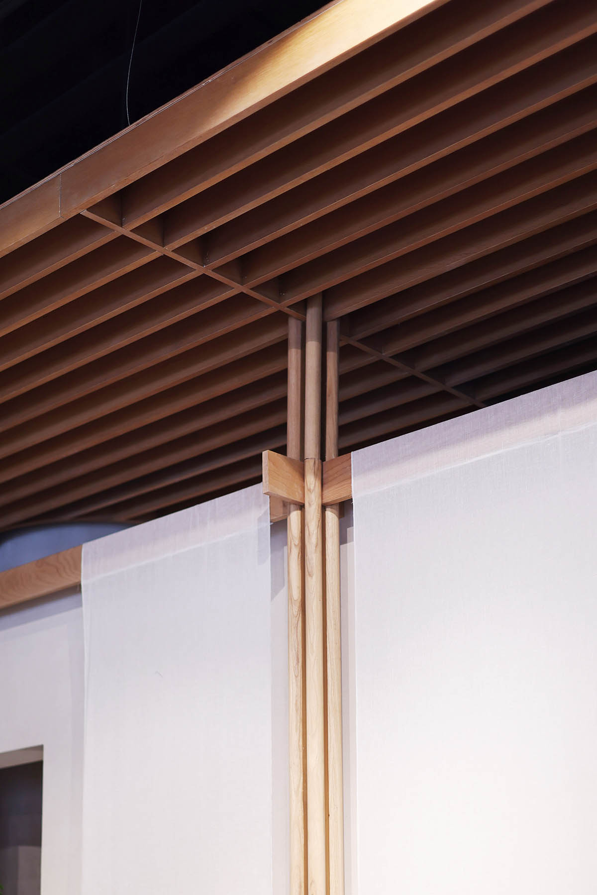 Neri&Hu adds fabric, marble and wooden panels to atelier evoking the spirit of textile-making