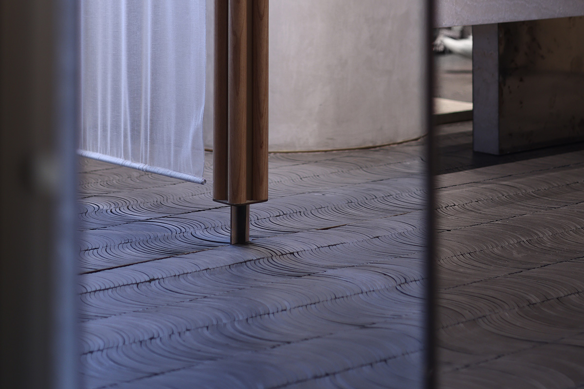 Neri&Hu adds fabric, marble and wooden panels to atelier evoking the spirit of textile-making