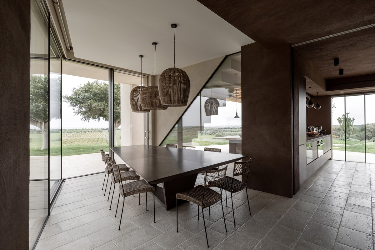 Holiday villa by Westway Architects comprises three distinct volumes made of Note stone in Italy 