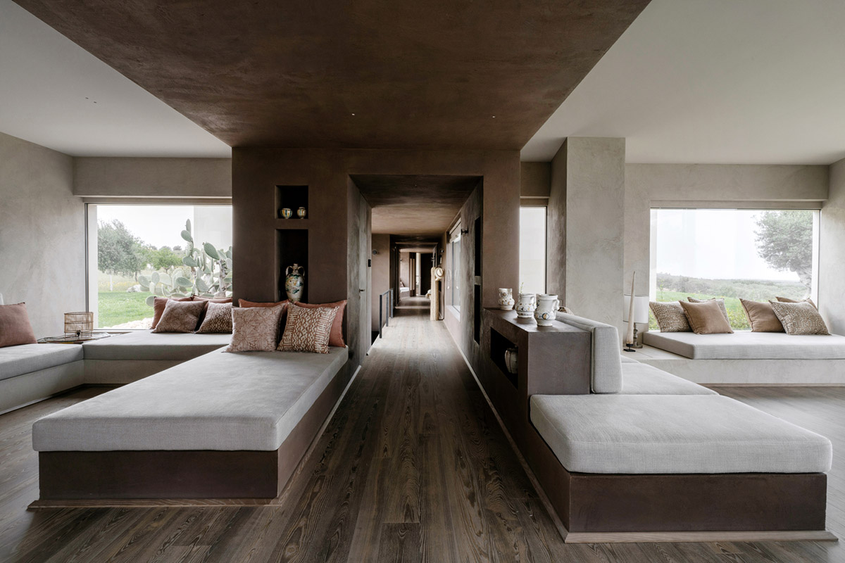 Holiday villa by Westway Architects comprises three distinct volumes made of Note stone in Italy 