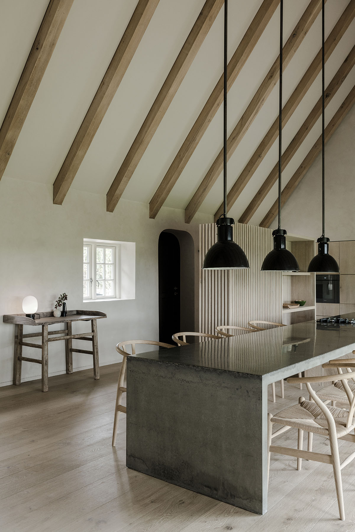 Jan Henrik Jansen and Marshall Blecher convert old thatched crofters cottage into a modern retreat