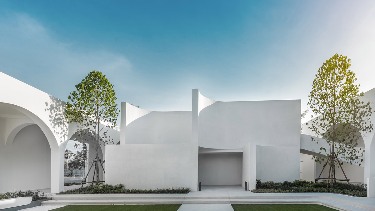 PHTAA creates flexible wedding venue with half-arch modular elements and white curved walls