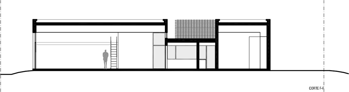 Nómade Arquitectura creates urban filter with large interlocked brick wall for house in Argentina