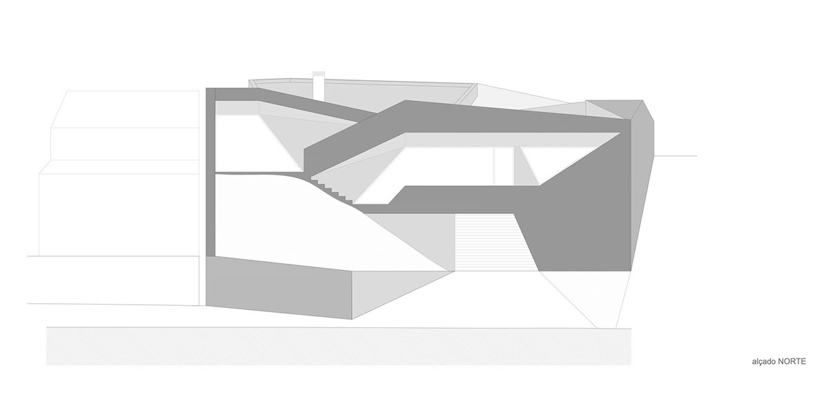 Contaminar Arquitectos built cave-like house from irregular walls inspired by rocky topography