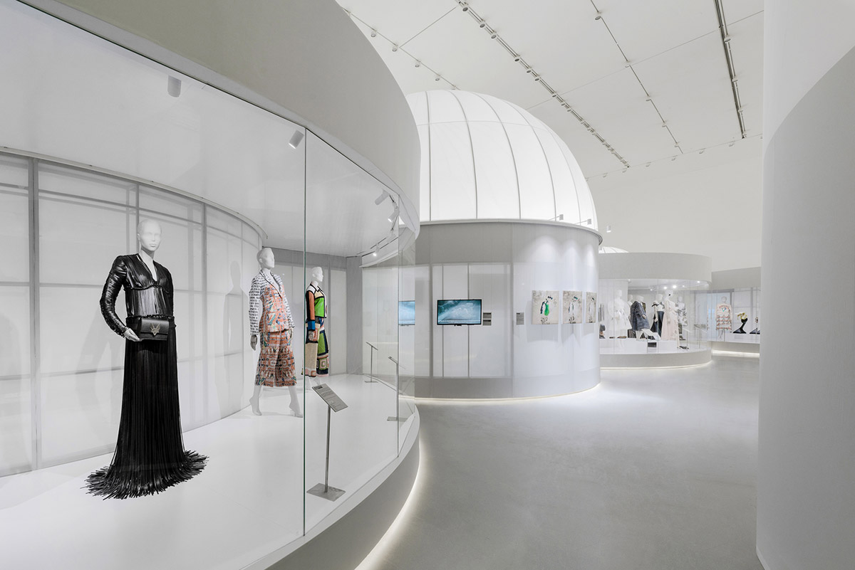 Studio 10 designs exhibition space with white tubular structures and black translucent ramps in China