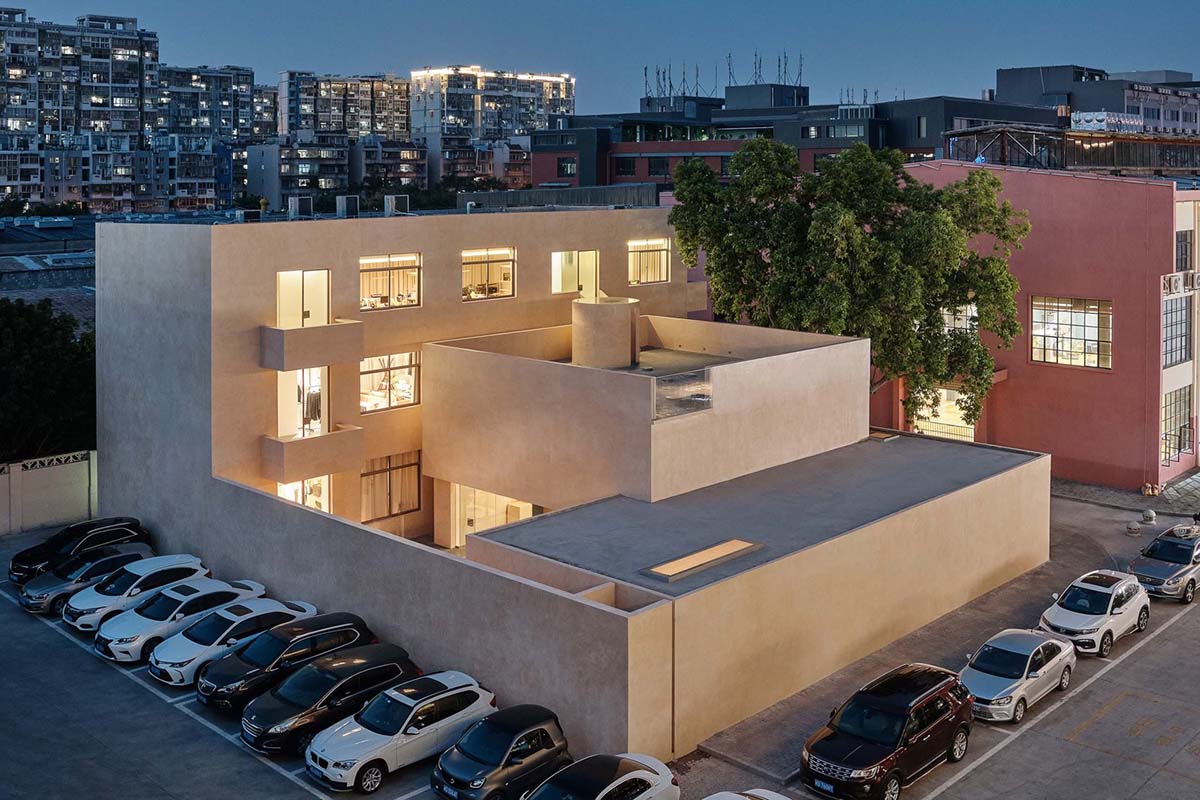 Ladder-Like sandalwood yellow volumes form Buddha artist's exhibition space and studio in China