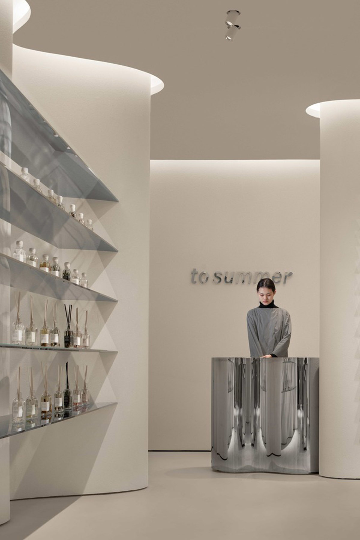 F.O.G. Architecture creates cave-like interiors with mirrored surfaces for aromatherapy store