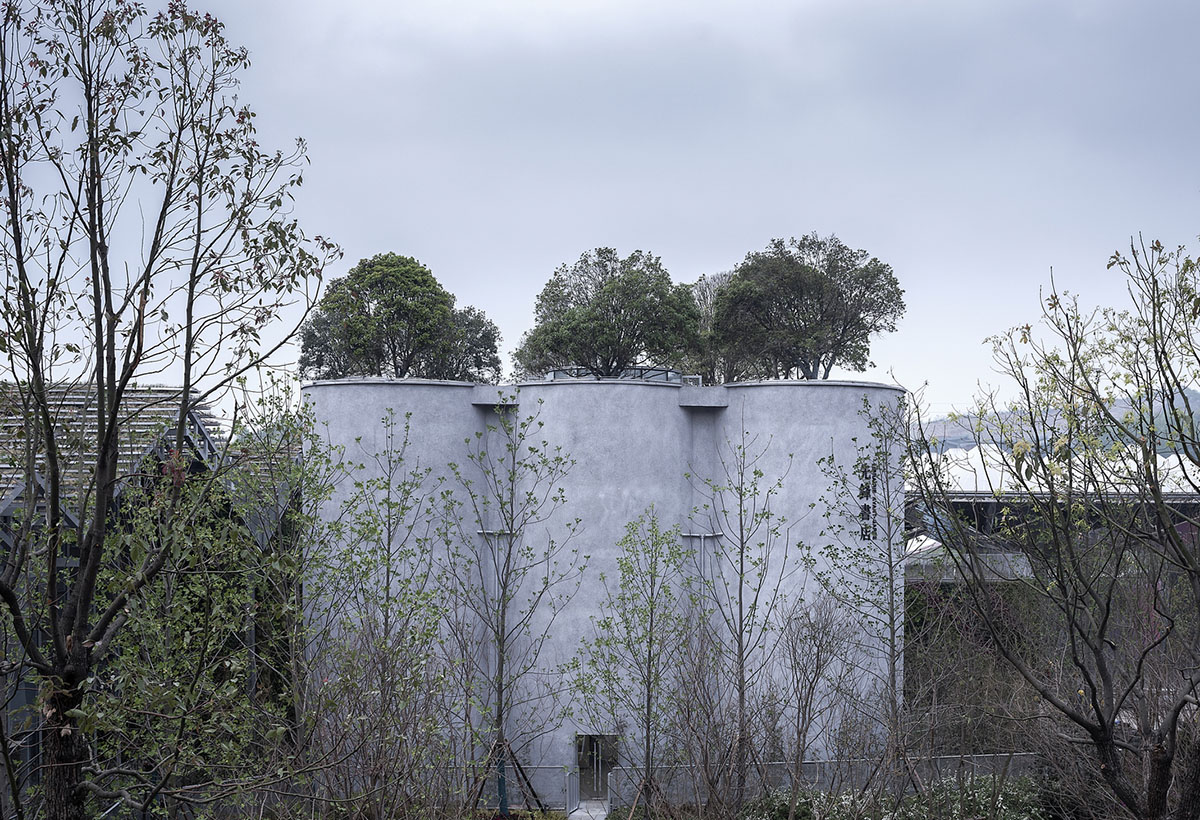 Ten towering cylindrical cement silos are converted to house immersive library of books in China