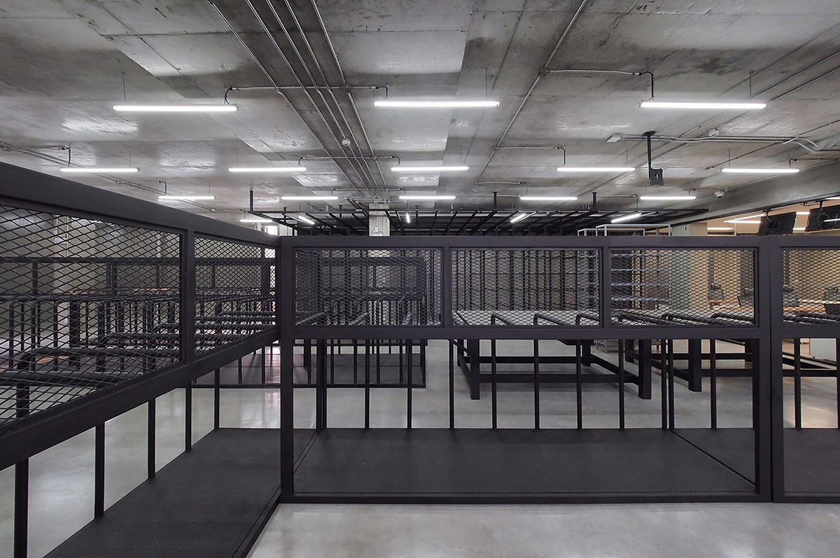 ASWA used physical character of leather to design this curved office building in Bangkok