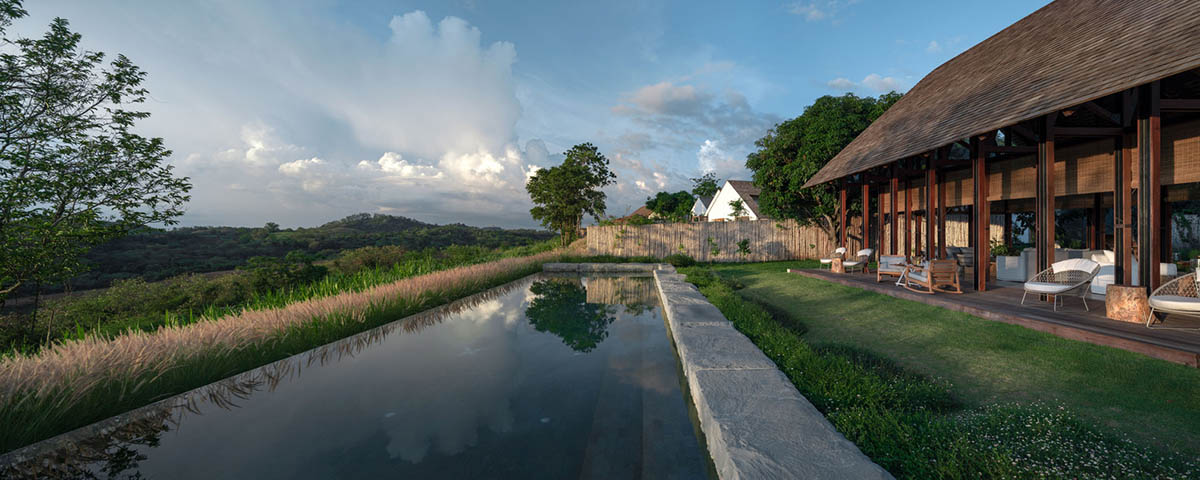 Onion completes rural hotel with private villas within organic fruit and vegetable farms in Thailand