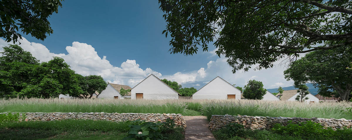 Onion completes rural hotel with private villas within organic fruit and vegetable farms in Thailand