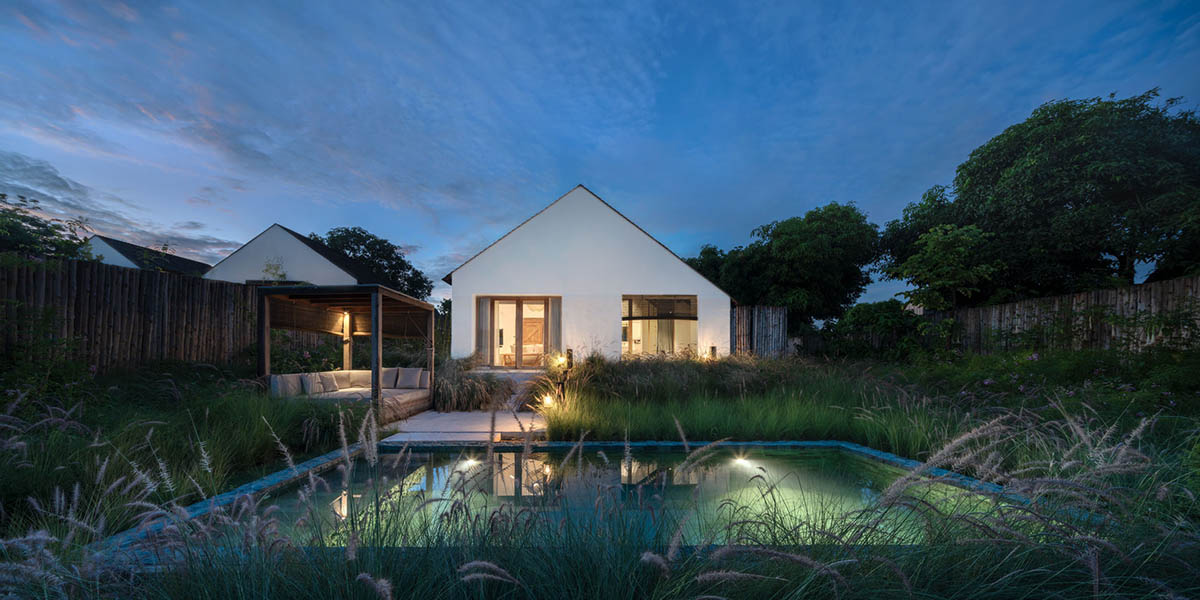 Onion completes rural hotel with private villas within organic fruit and vegetable farms in Thailand