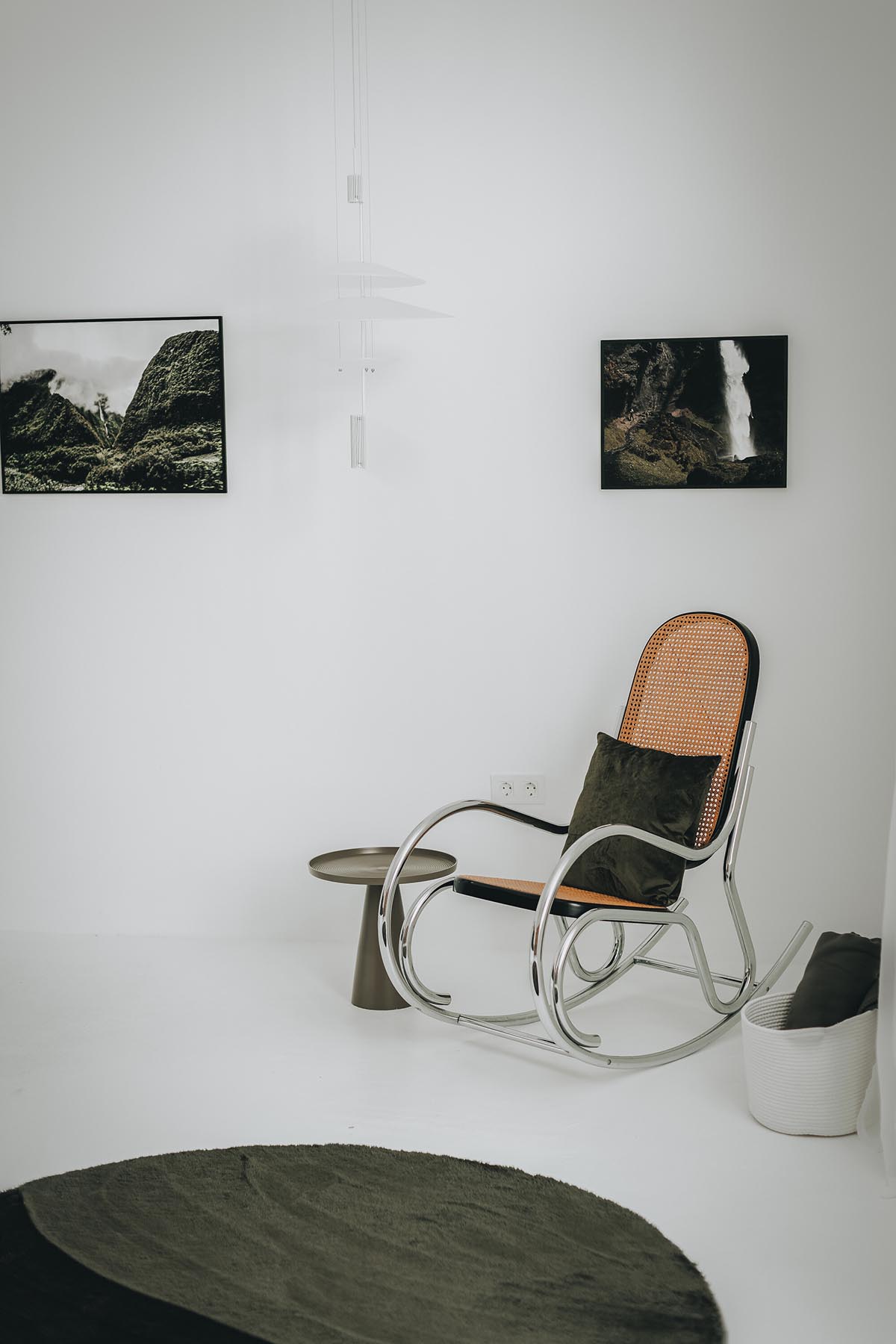Lava-black landscape and palm trees inform this all-white house by OOOOX in Spain 