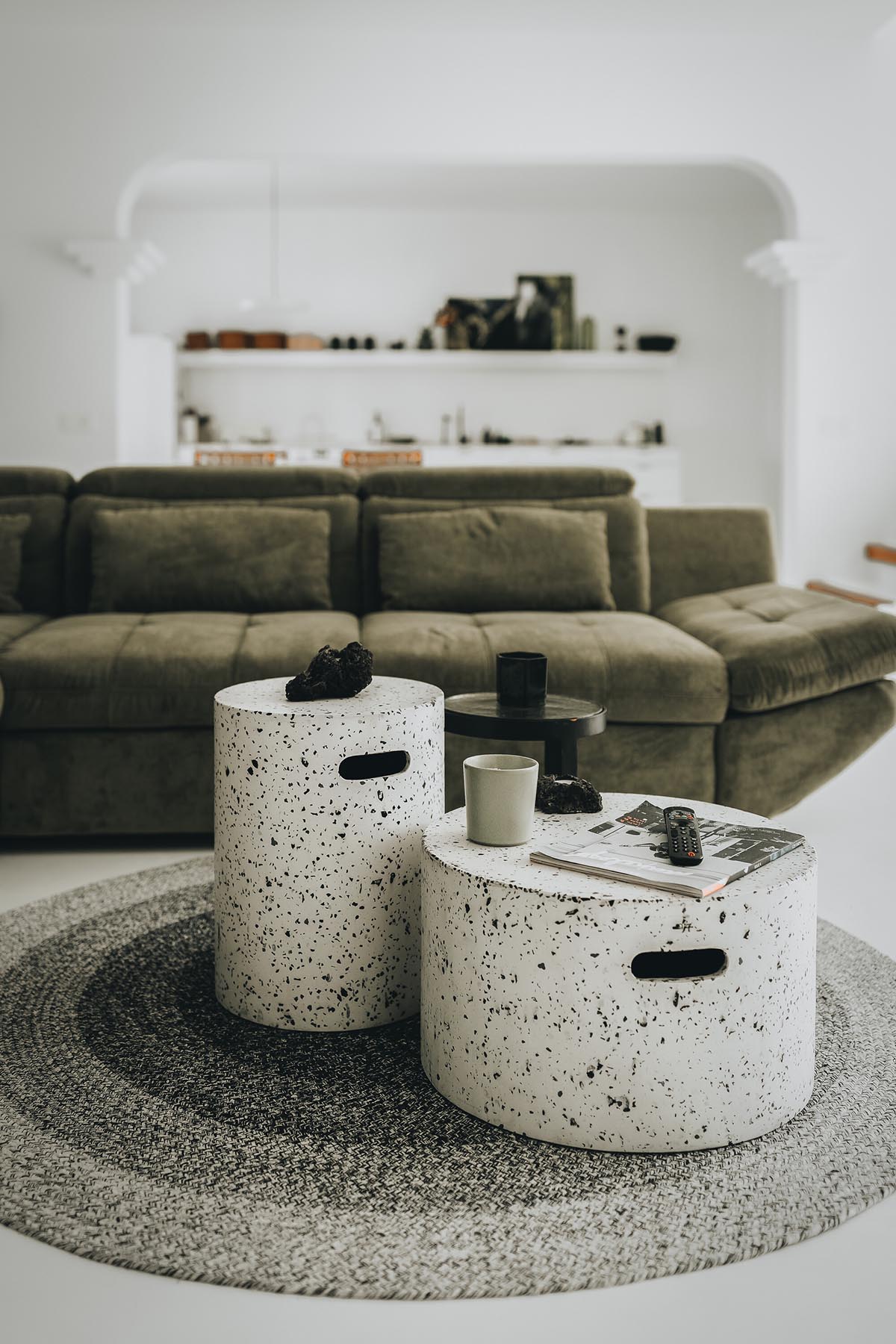 Lava-black landscape and palm trees inform this all-white house by OOOOX in Spain 