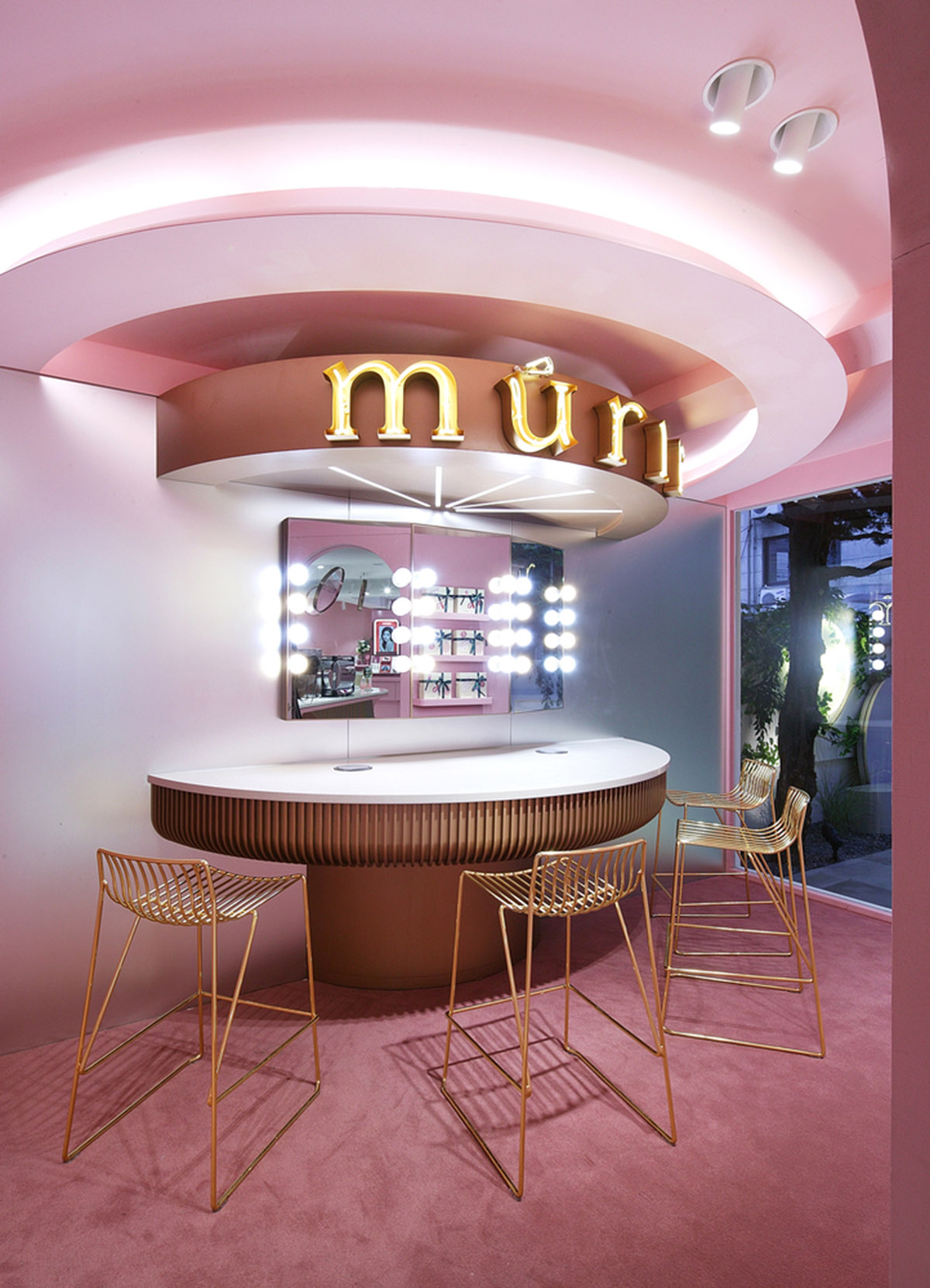 Collective B's beauty shop in South Korea features pink-hued colors and layered walls