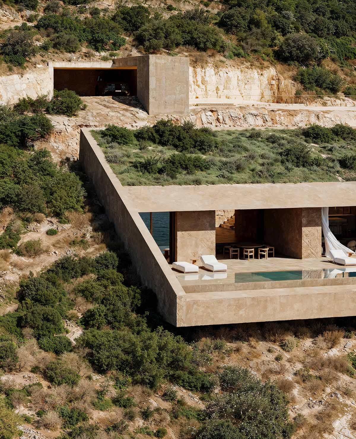 Oppenheim Architecture unveils Signature Villa emerging from the cliffs of Jal&euml; Bay in Albania