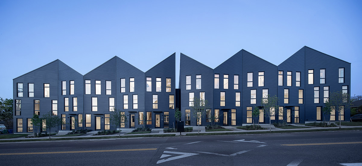 Waechter Architecture completes Origami townhouses with folded facades in Portland