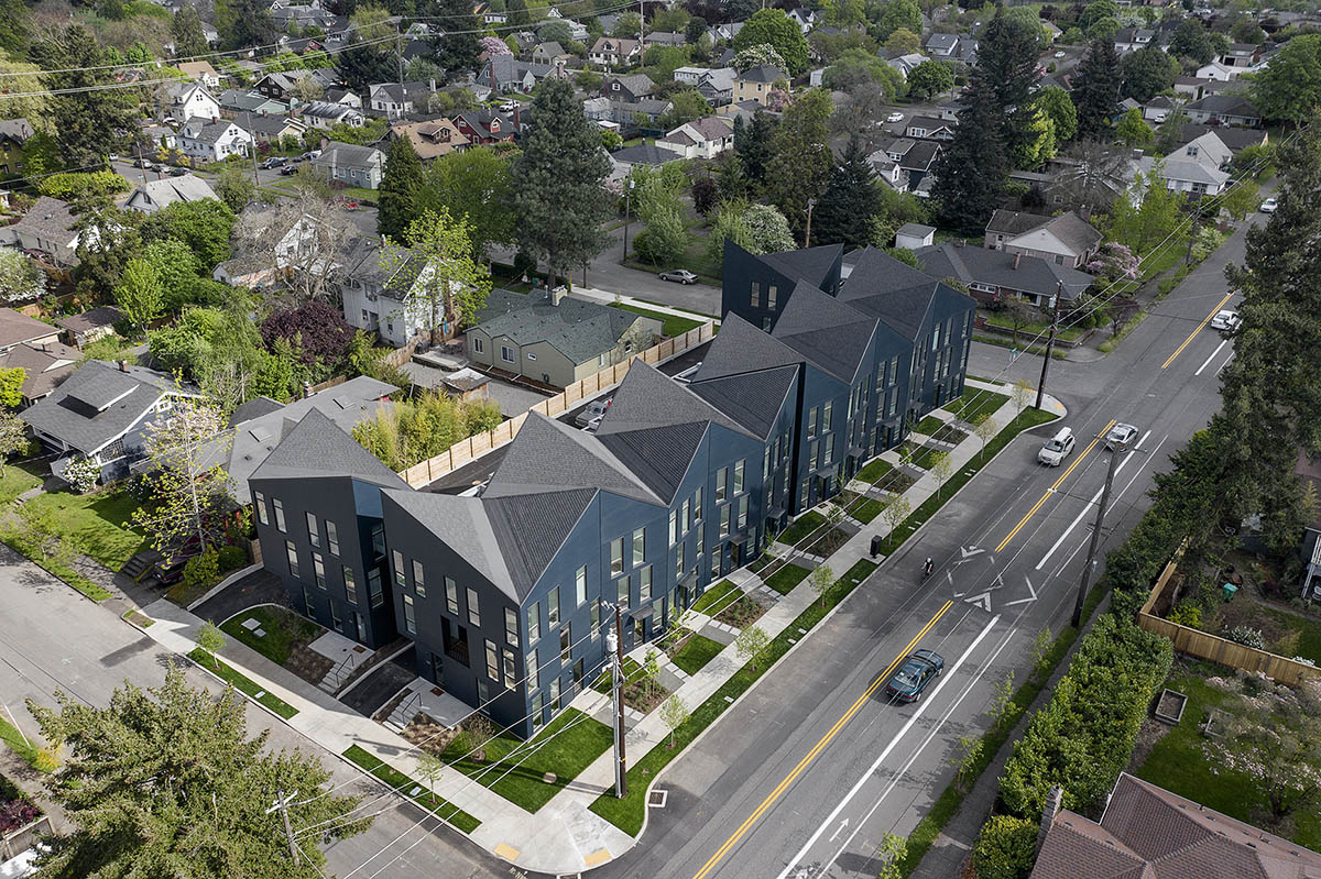Waechter Architecture completes Origami townhouses with folded facades in Portland