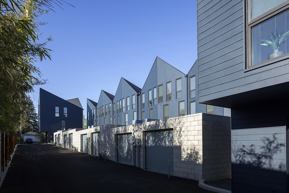 Waechter Architecture completes Origami townhouses with folded facades in Portland