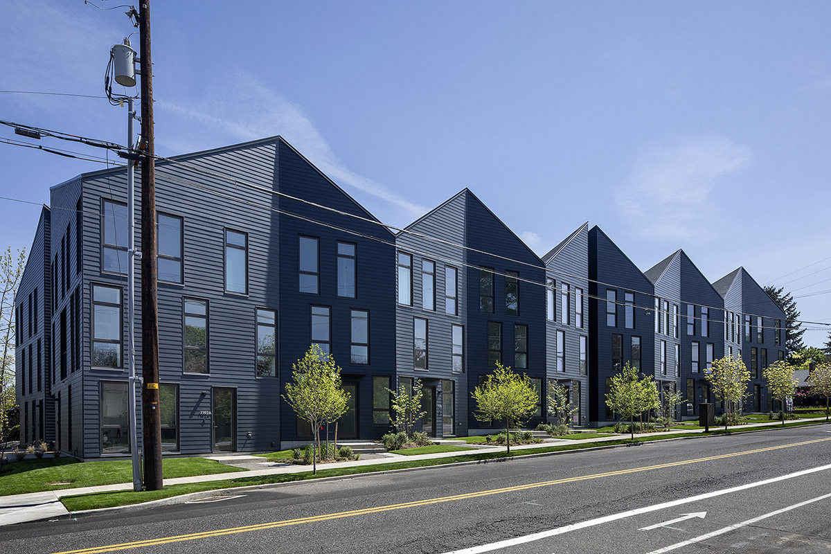 Waechter Architecture completes Origami townhouses with folded facades in Portland