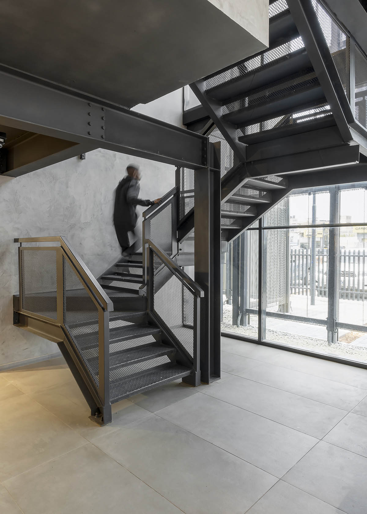 Lagos context informs Oshinowo Studio-designed Adidas flagship store clad in perforated sheets