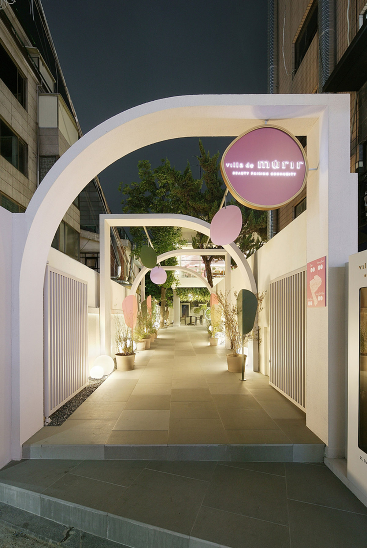 Collective B's beauty shop in South Korea features pink-hued colors and layered walls