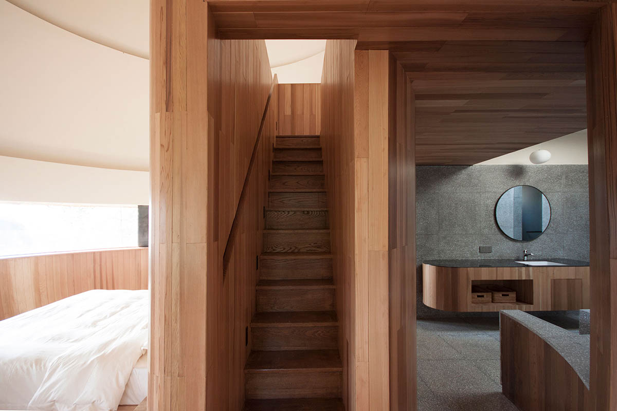 ZJJZ completes a mushroom-formed wood house in a pine forest of Jiangxi