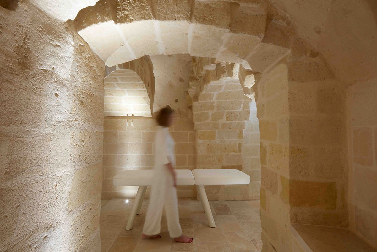 Interiors of this cave hotel and spa by Simone Micheli act like work of art with excavated surfaces