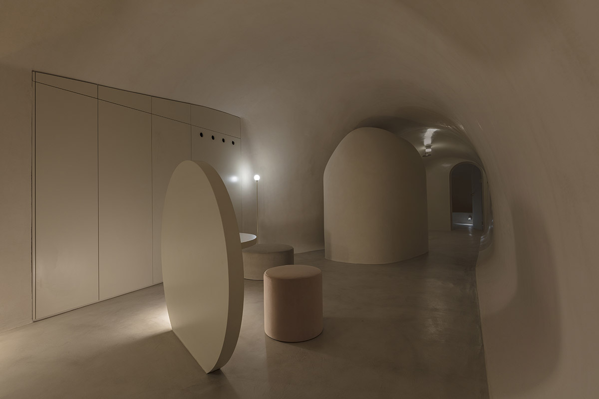 Kapsimalis Architects converts old caved houses into holiday residences on Santorini Island
