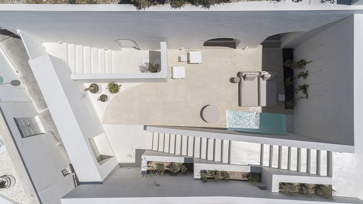 Kapsimalis Architects converts old caved houses into holiday residences on Santorini Island