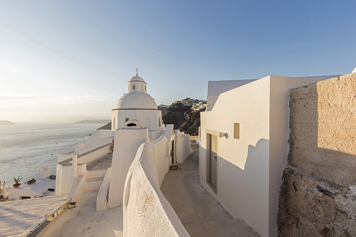 Kapsimalis Architects converts old caved houses into holiday residences on Santorini Island