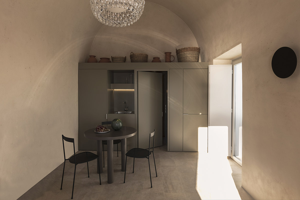 Kapsimalis Architects converts old caved houses into holiday residences on Santorini Island