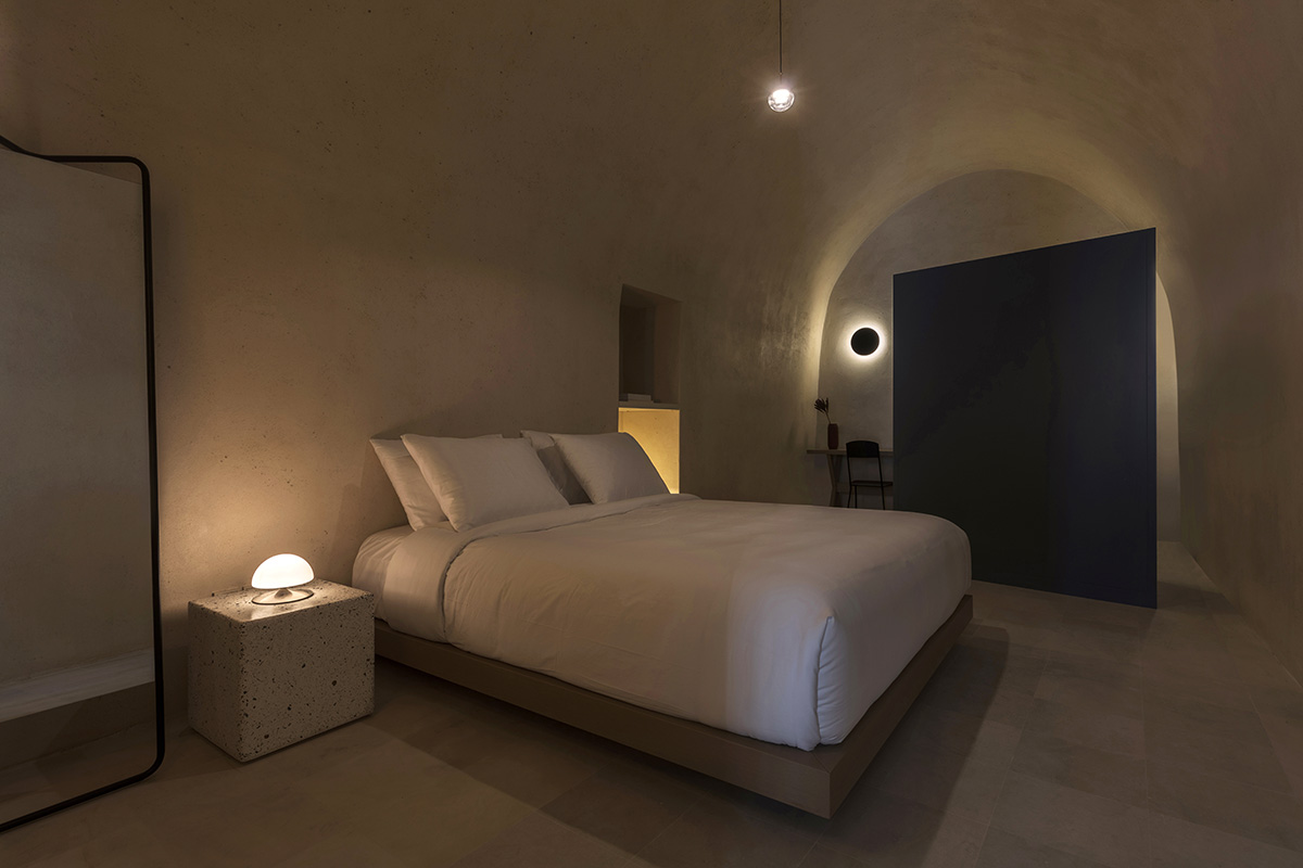 Kapsimalis Architects converts old caved houses into holiday residences on Santorini Island