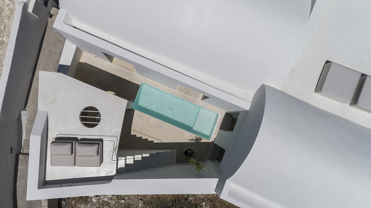 Kapsimalis Architects converts old caved houses into holiday residences on Santorini Island