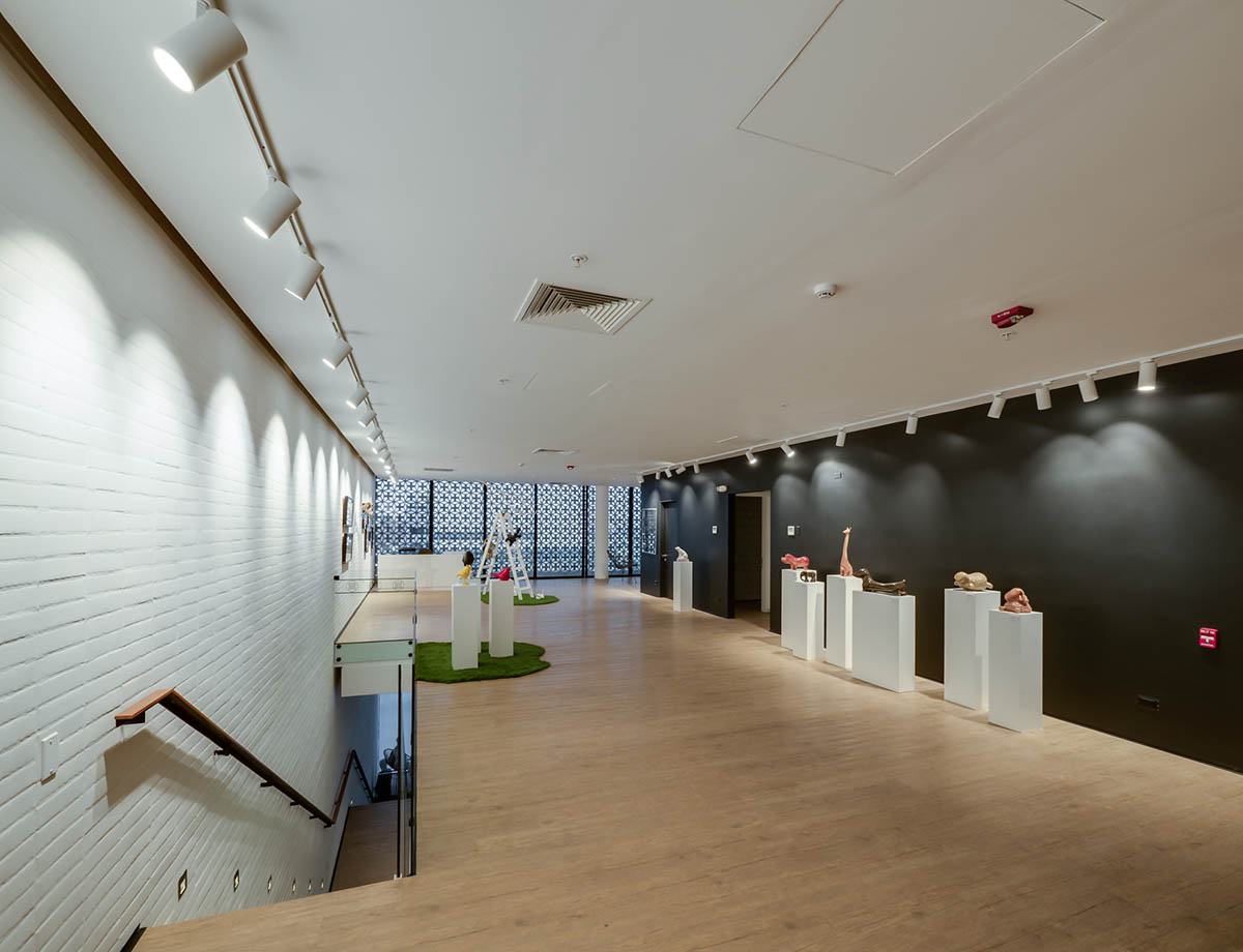 Nómena Arquitectos completes retail and exhibition space with perforated façade in Peru