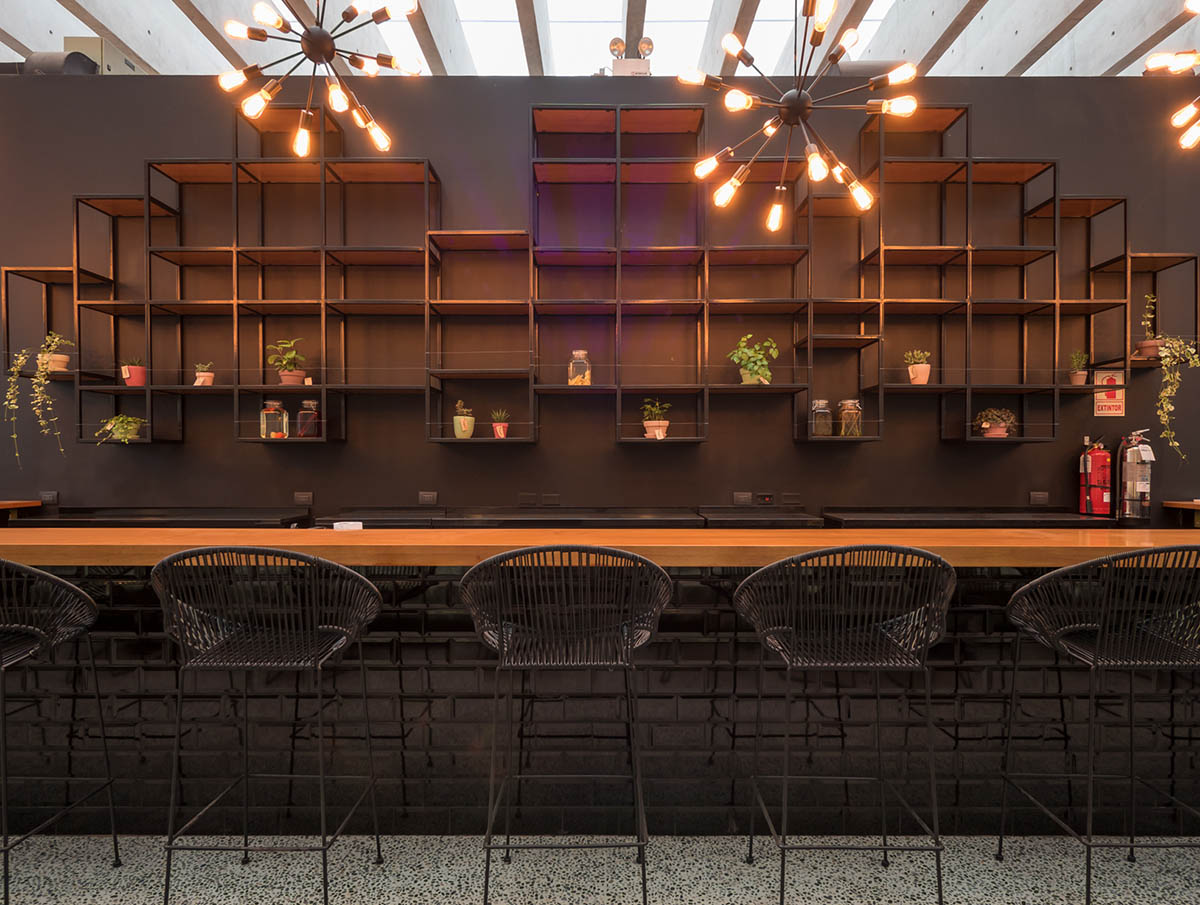 Nómena Arquitectos completes retail and exhibition space with perforated façade in Peru