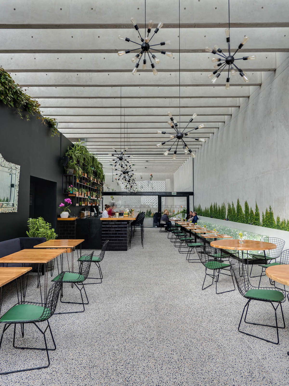 Nómena Arquitectos completes retail and exhibition space with perforated façade in Peru