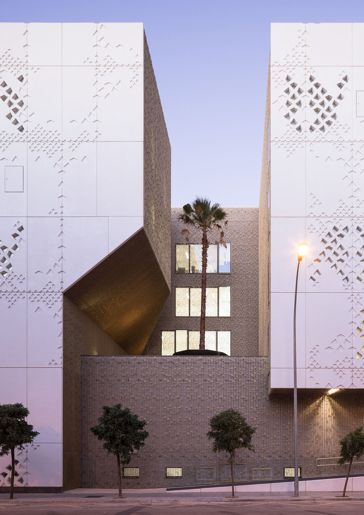 Mecanoo envisions Palace of Justice in Cordoba with cutouts and porous walls