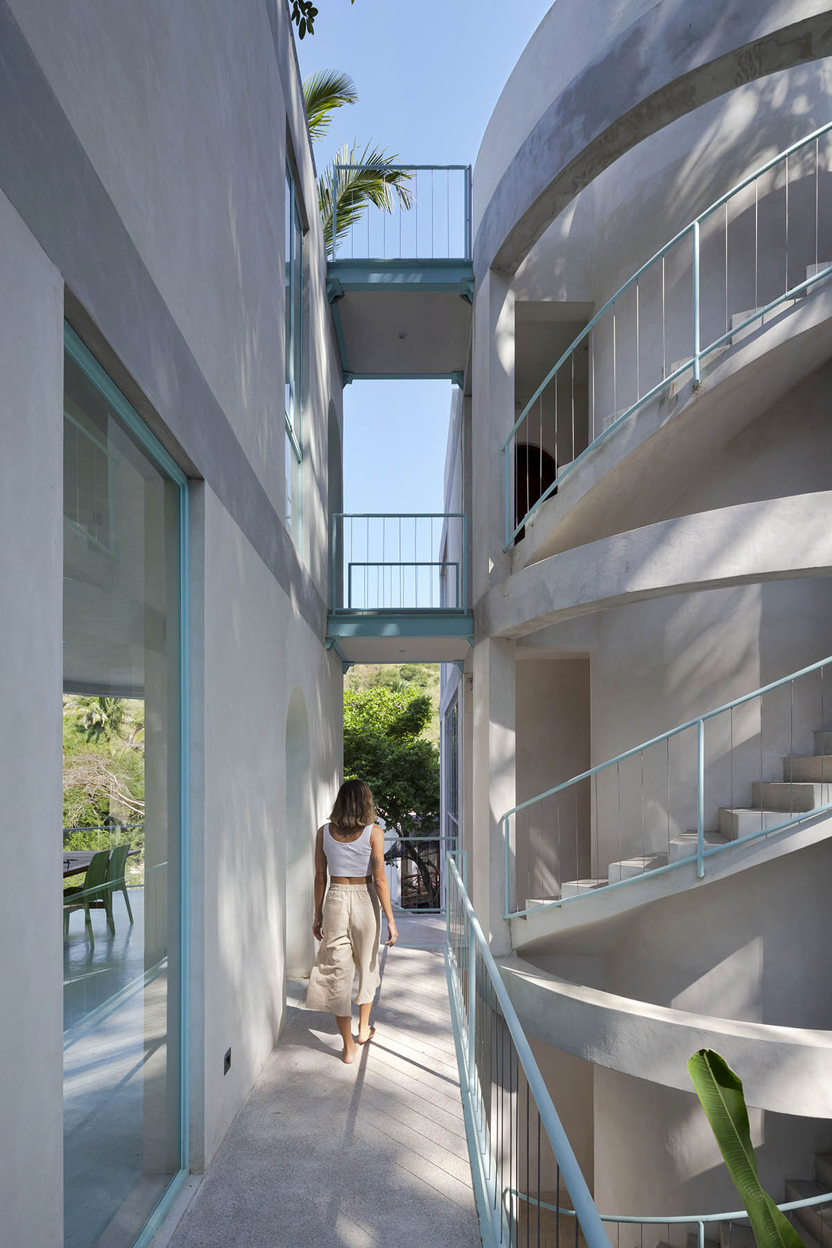 Palma designs a pair of hybrid apartments with creamy tones and light blue additions in Mexico 