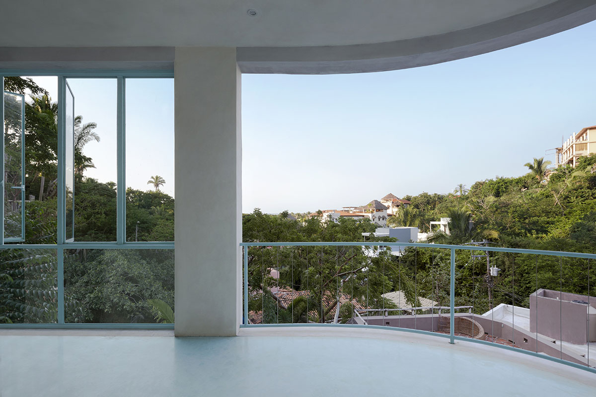 Palma designs a pair of hybrid apartments with creamy tones and light blue additions in Mexico 