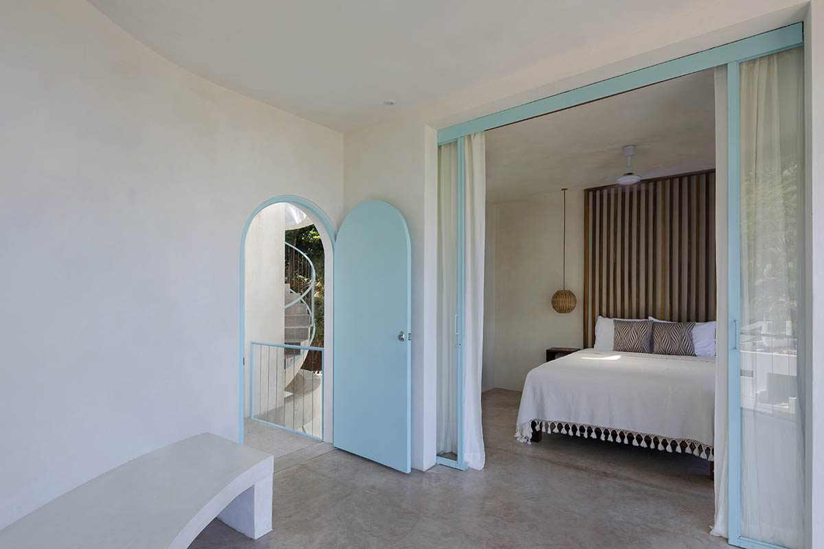 Palma designs a pair of hybrid apartments with creamy tones and light blue additions in Mexico 