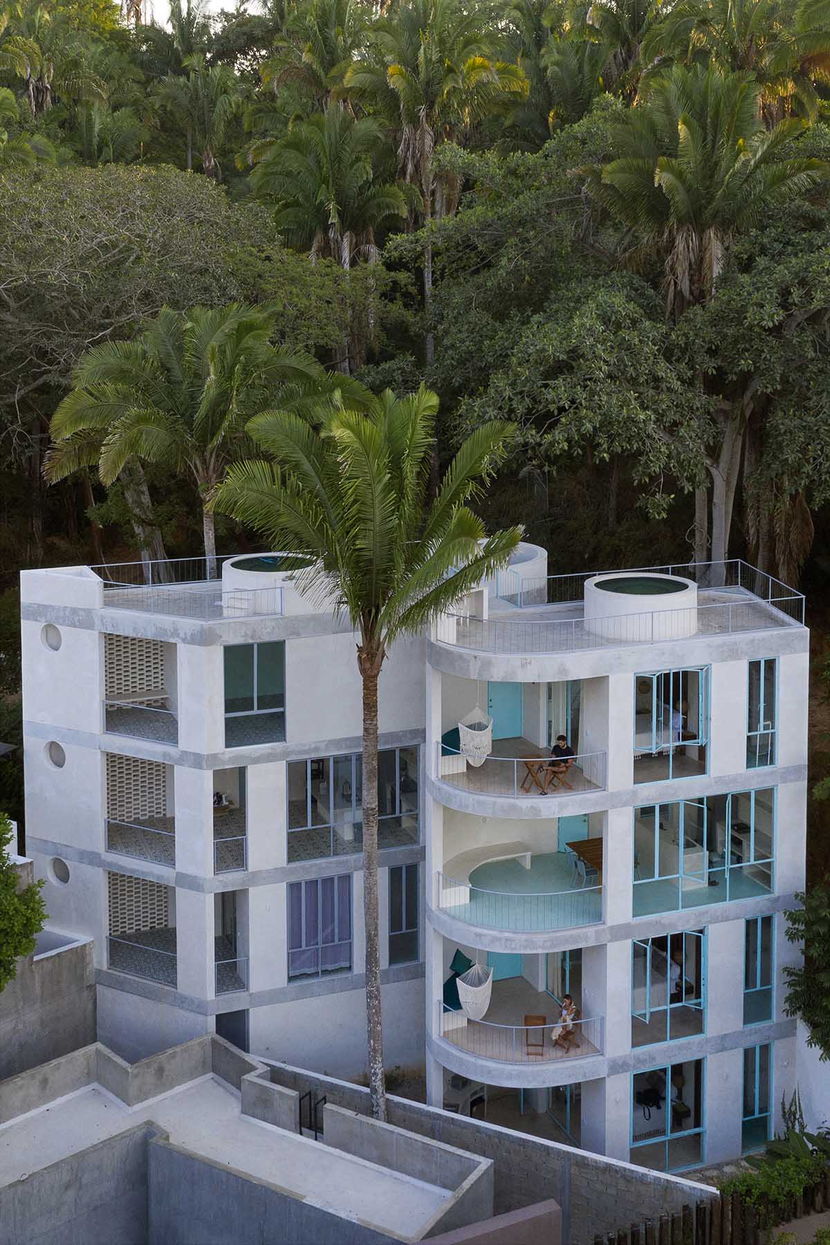Palma designs a pair of hybrid apartments with creamy tones and light blue additions in Mexico 