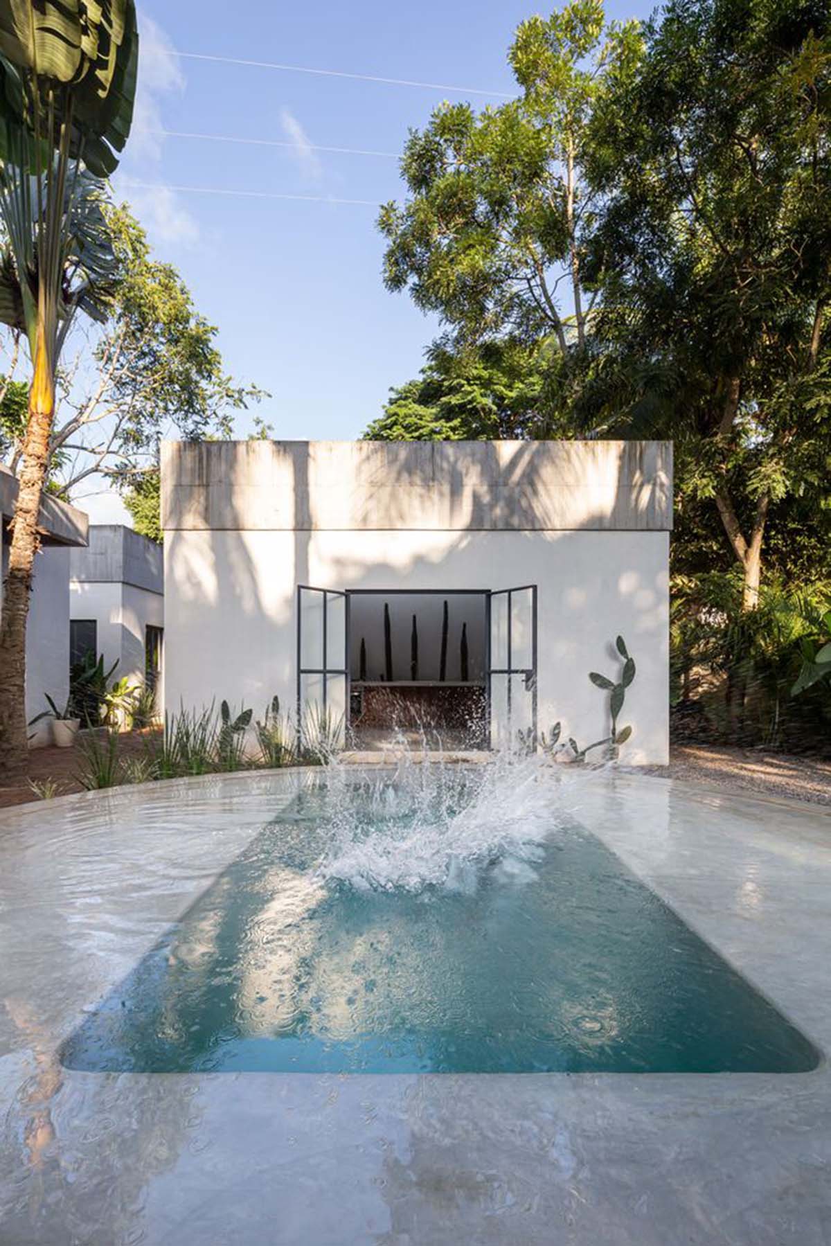 Palma designs house that makes swimming pool and courtyard the heart of the house in Mexico