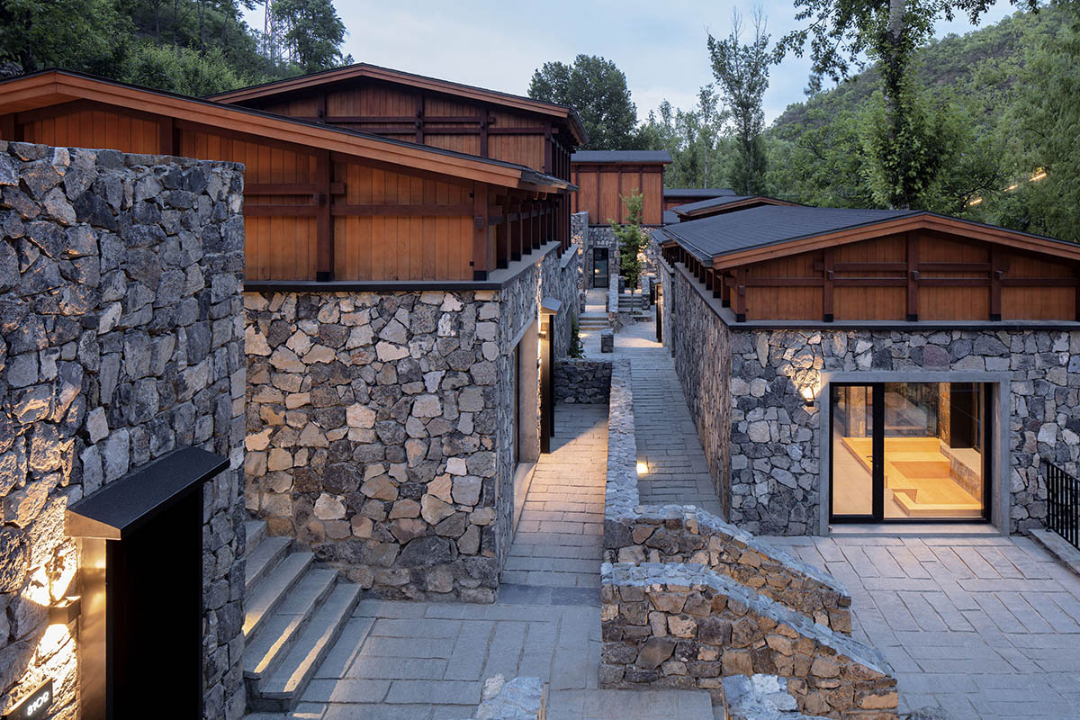 Penda China built resort with solid stones and wood structures evoking folk houses of China 