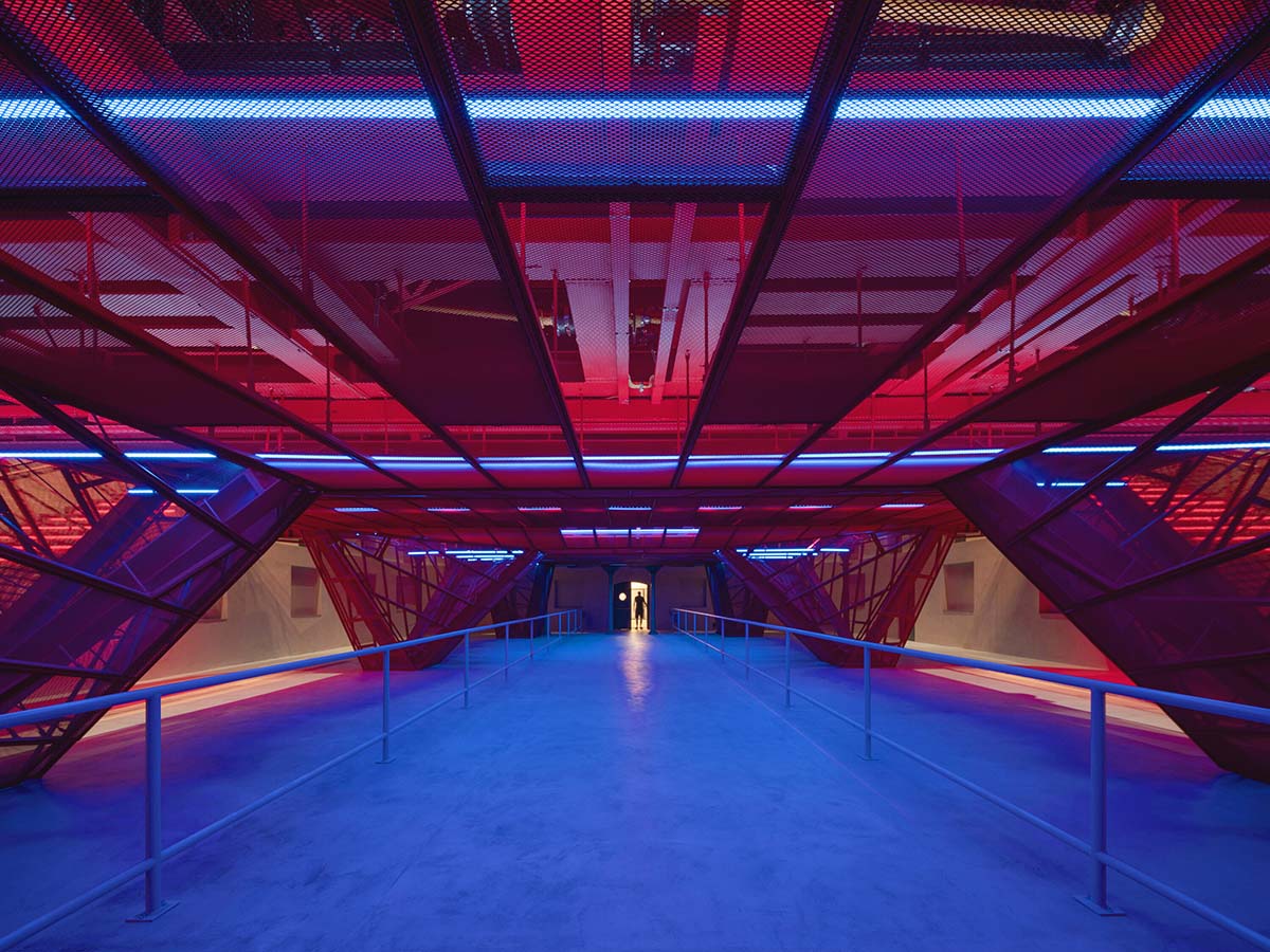 Bold red concert hall makes a statement as a harmonious blend of history and modern technology 