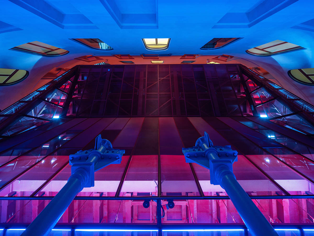 Bold red concert hall makes a statement as a harmonious blend of history and modern technology 