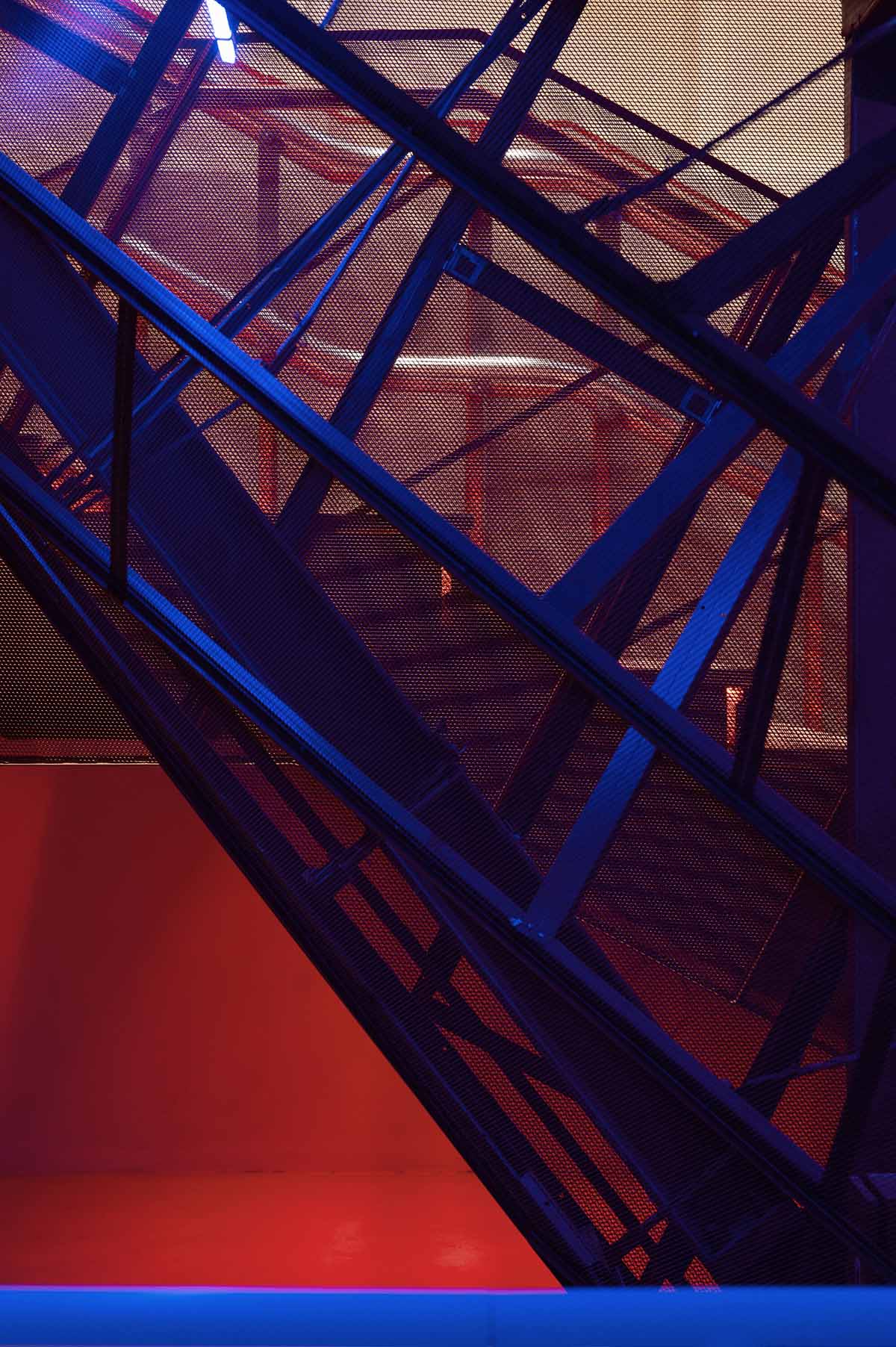 Bold red concert hall makes a statement as a harmonious blend of history and modern technology 