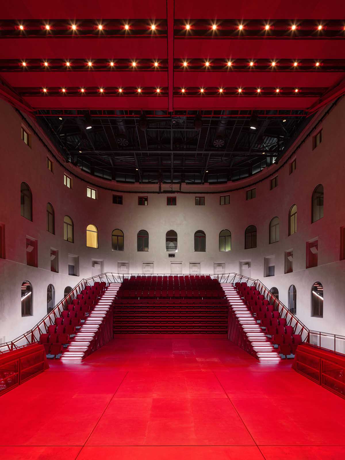 Bold red concert hall makes a statement as a harmonious blend of history and modern technology 