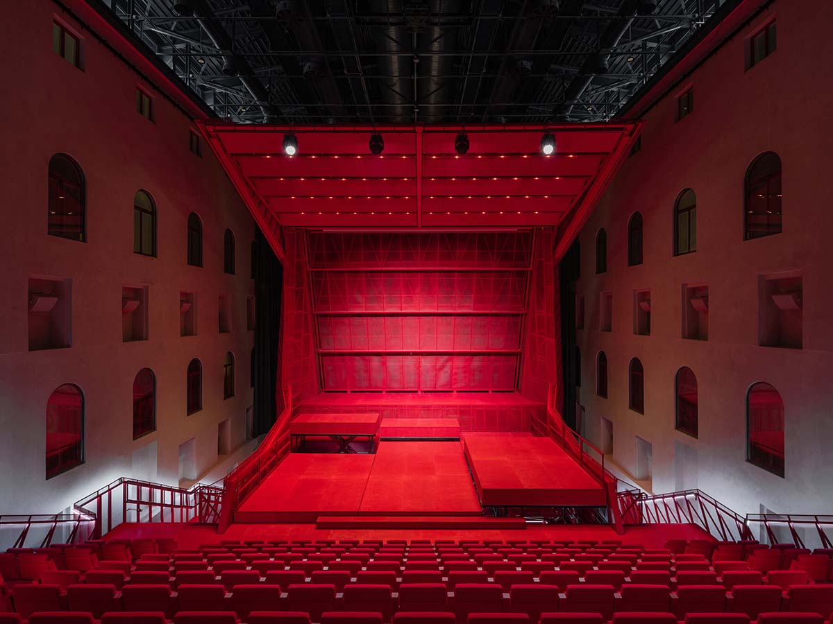 Bold red concert hall makes a statement as a harmonious blend of history and modern technology 