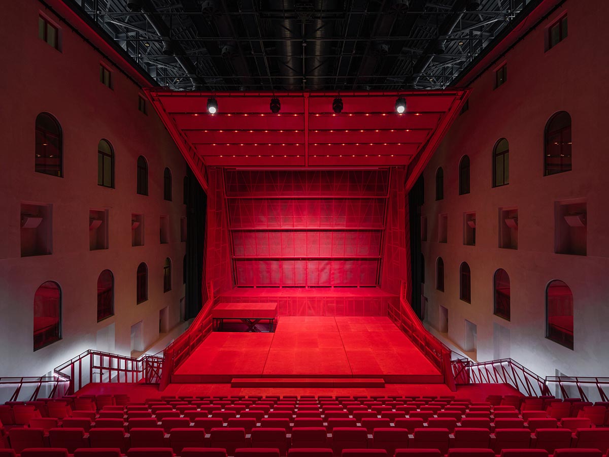 Bold red concert hall makes a statement as a harmonious blend of history and modern technology 
